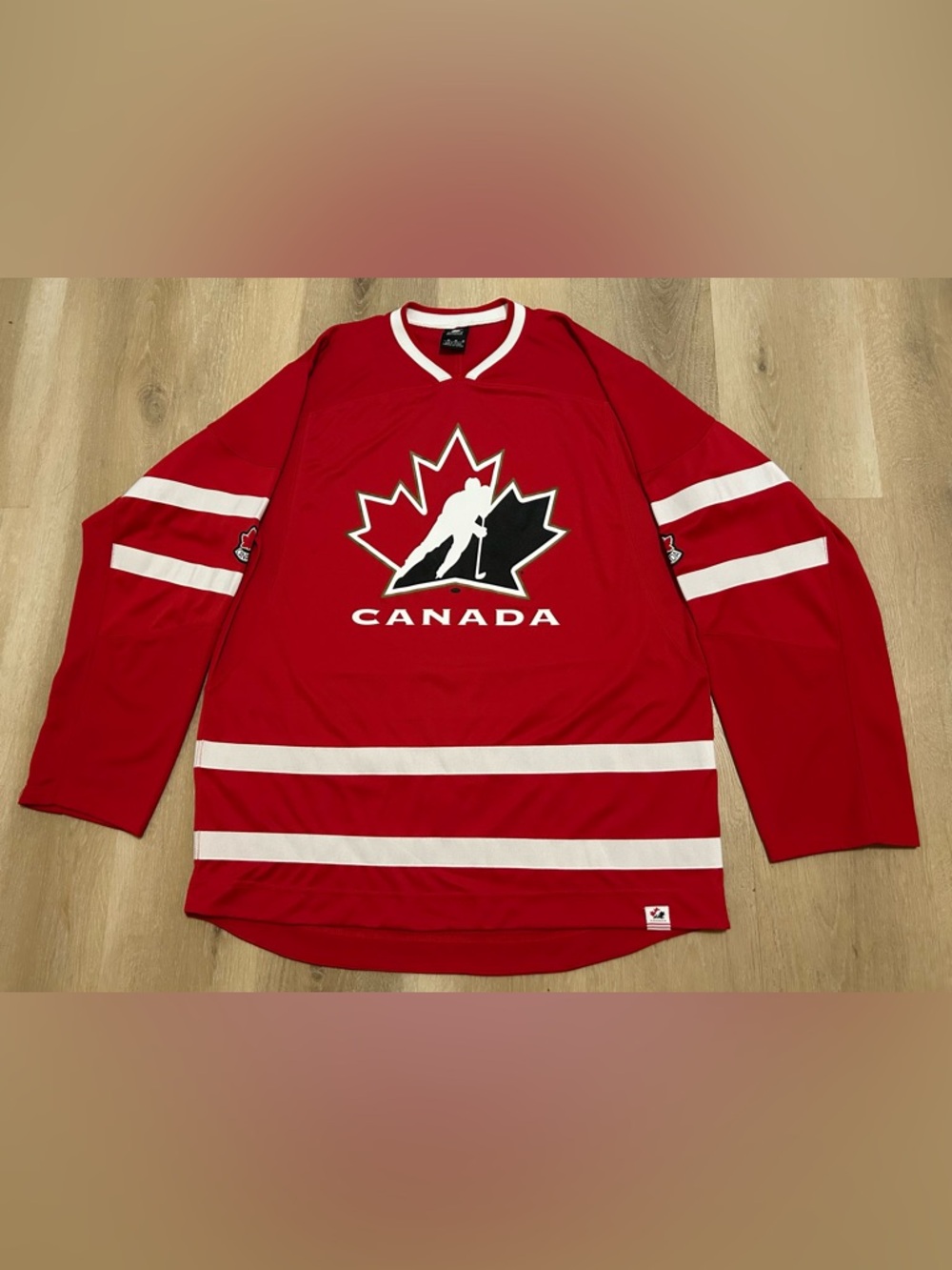 Sports specialties Canada Red Hockey Jersey with White Stripes